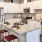 a kitchen with white cabinets