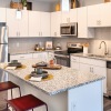 Well-lit kitchen with ample counter space